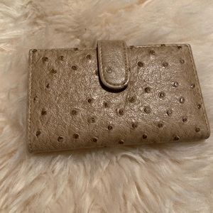 Ostrich pattern wallet with multiple card slots. RFID blocking.